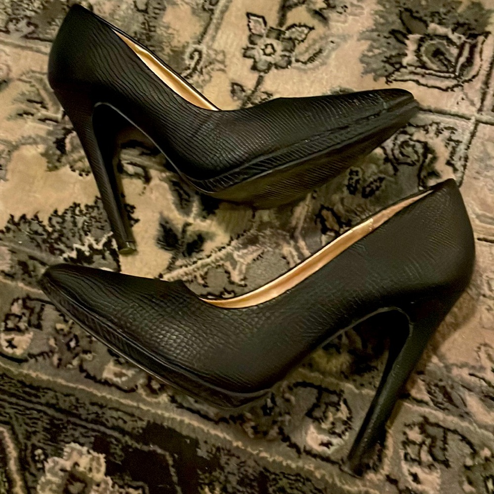 Black pointed toe heels